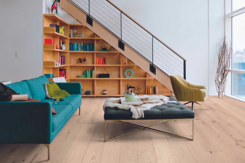 white oak hardwood in Scandi style living room with large windows and pops of colour